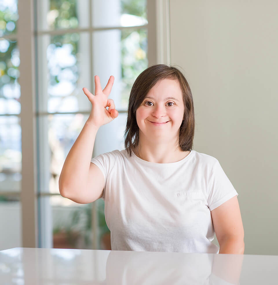 person holding hand up